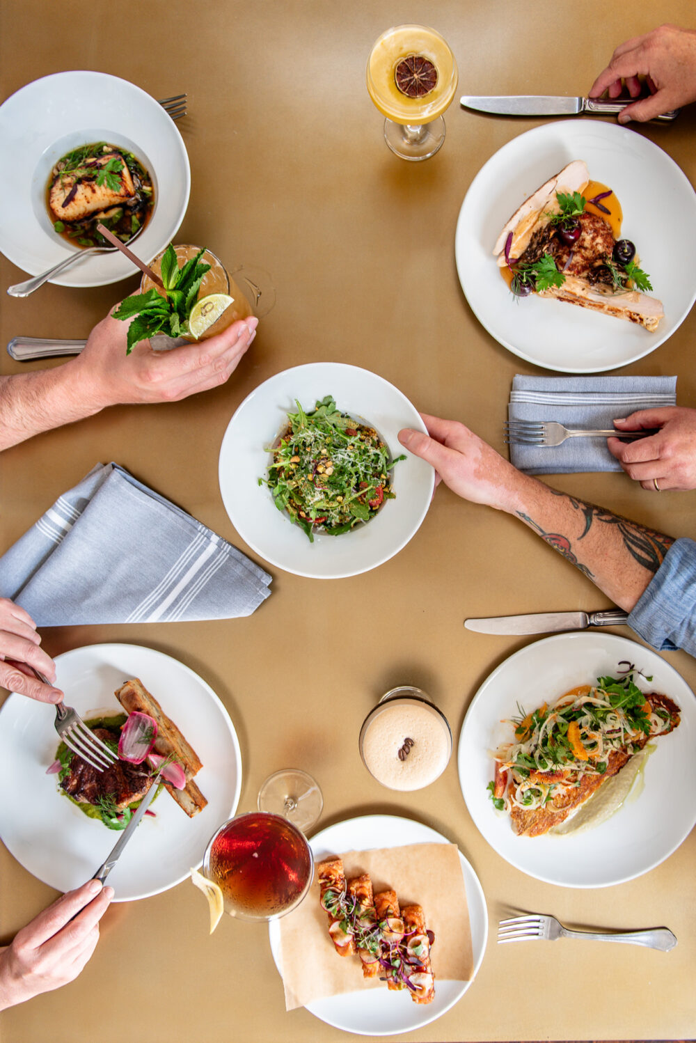 Styled overhead of dishes at a table, shot for a Connecticut restaurant